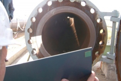 Using a mirror as a non heat producing light source to check for debris